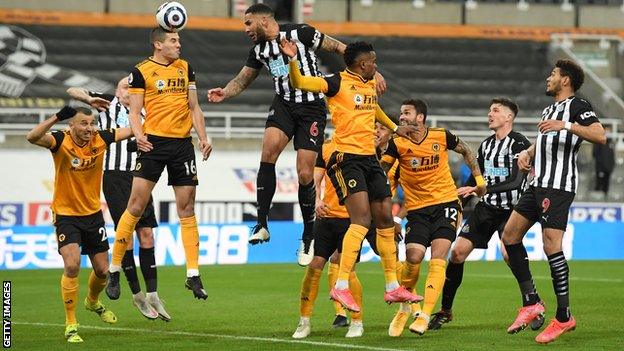 Jamal Lascelles scores Newcastle's goal against Wolves