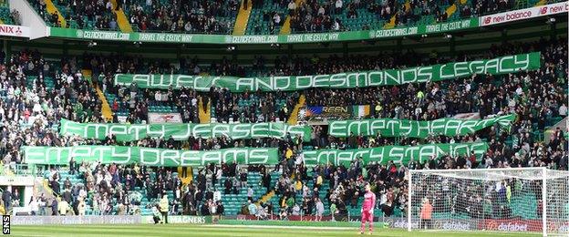 A Celtic banner reads: Lawell (sic) and Desmond's legacy; empty jerseys; empty hearts; empty dreams; empty stands."