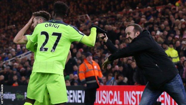 Origi celebrated with a fan