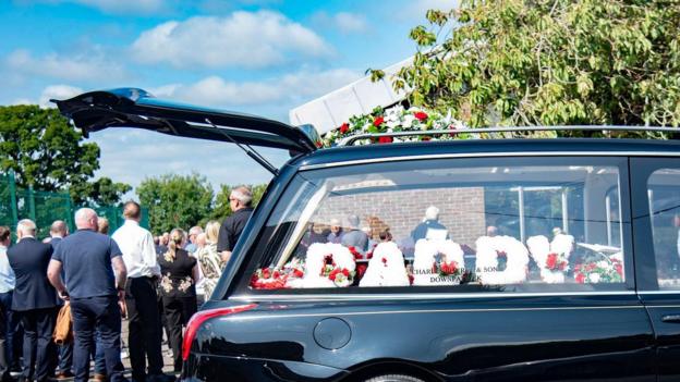 Downpatrick: Funeral held for murder victim Stephen Brannigan - BBC News