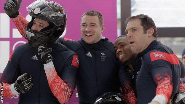 Bruce Tasker alongside his bobsleigh team-mates John James Jackson, Stuart Benson and Joel Fearon at the 2014 Winter Olympics