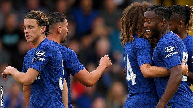 Michy Batshuayi (right) celebrates with team-mates