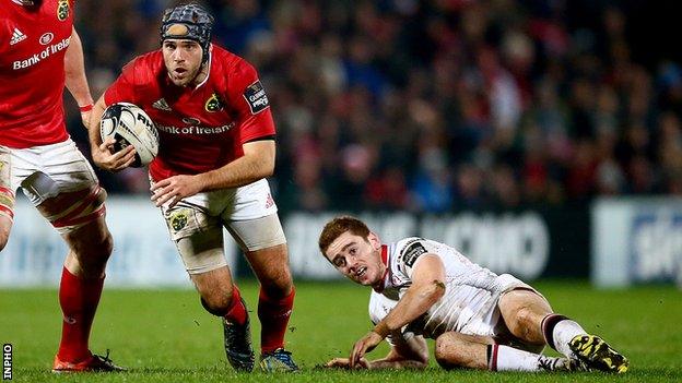 Munster's Duncan Casey bursts past Paddy Jackson at Thomond Park last October