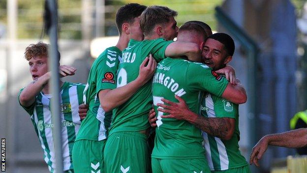 Yeovil players celebrate their goal against Solihull Moors