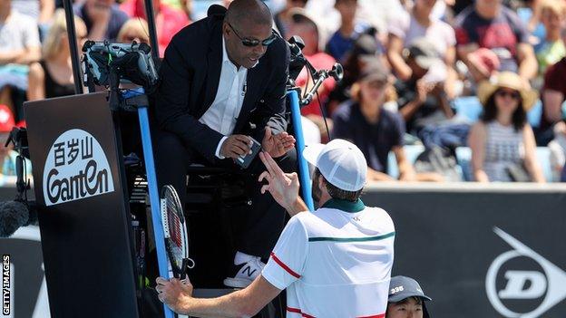 Carlos Bernardes speaks with Reilly Opelka