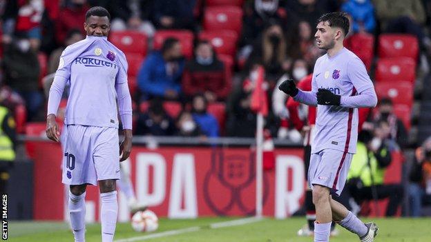 Ansu Fati (left) cut an emotional figure after suffering a recurrence of his hamstring injury against Athletic Bilbao.