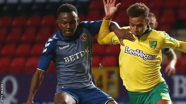 Regan Charles-Cook of Charlton Athletic and Josh Murphy of Norwich City battle for possession