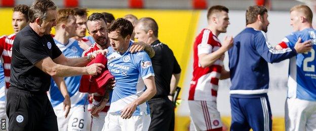 Saints' Danny Swanson (number 11) saw red for the altercation with Richard Foster