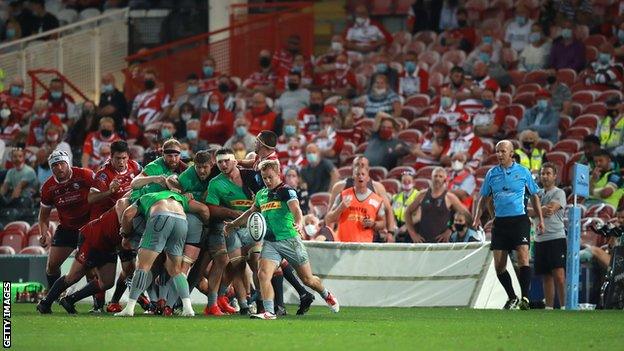 Gloucester face Harlequins in a Premiership rugby match at Kingsholm Stadium that saw 1,000 socially-distanced fans attend