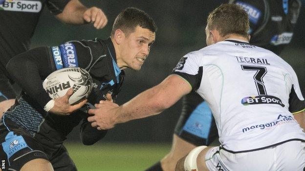 Glasgow Warriors' Grayson Hart (left) in action against Ospreys