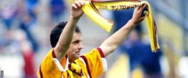 Davie Cooper celebrates a famous Scottish Cup final triumph for Motherwell