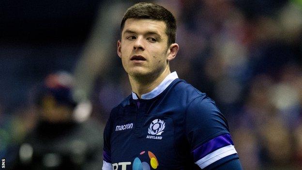 Blair Kinghorn prepares to come on for his Test debut against England