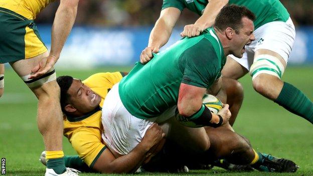 Cian Healy is injured in a tackle by Scott Sio