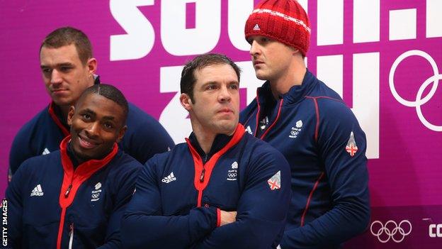 The British bobsleigh four-man team watch results come in in Sochi