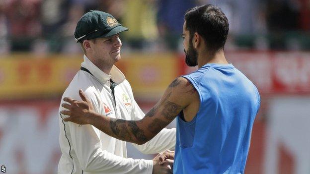 Australia captain Steve Smith (left) and India counterpart Virat Kohli shake hands after the fourth Test