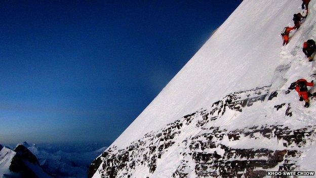 Khoo Swee Chiow climbing K2 with fellow climbers