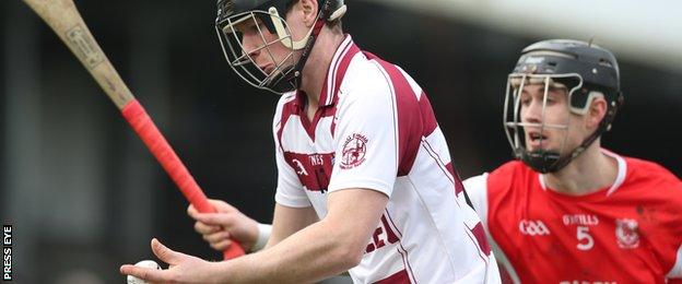 Man of the match Sean Moran is about to challenge Slaughtneil goal-scorer Se McGuigan