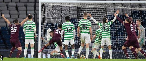 Josh Ginnelly scores for Hearts