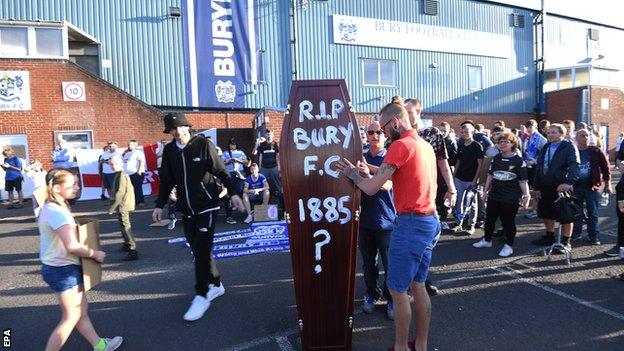 Bury fans outside Gigg Lane