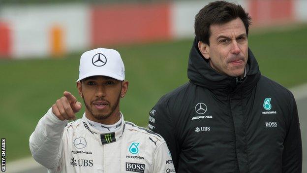 Lewis Hamilton, left, and Mercedes F1 boss Toto Wolff