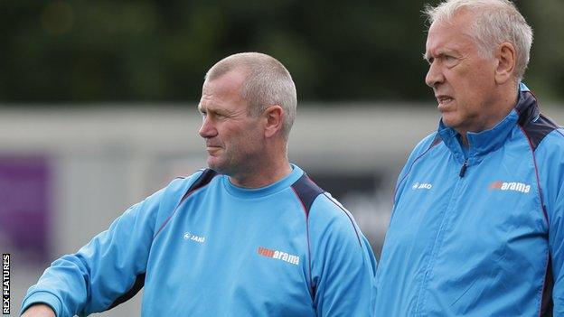 Alan Dowson and Martin Tyler look on from the sidelines