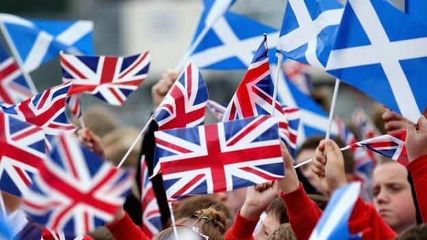 Scottish flags and Union Jacks are waved at the opening of the Borders Railway at Tweedbank Station on September 9, in Tweedbank, Scotland