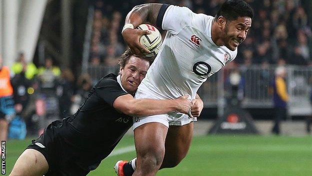 Manu Tuilagi is tackled by Ben Smith