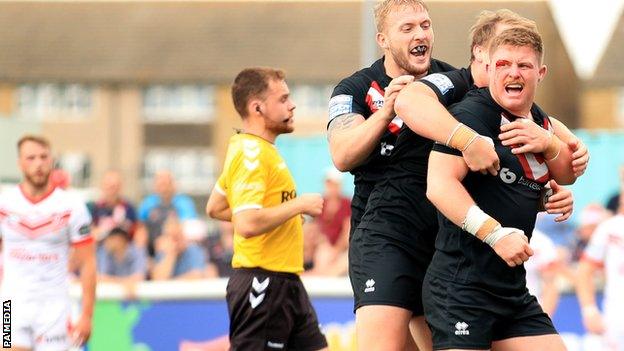 London Broncos celebrate a try against St Helens