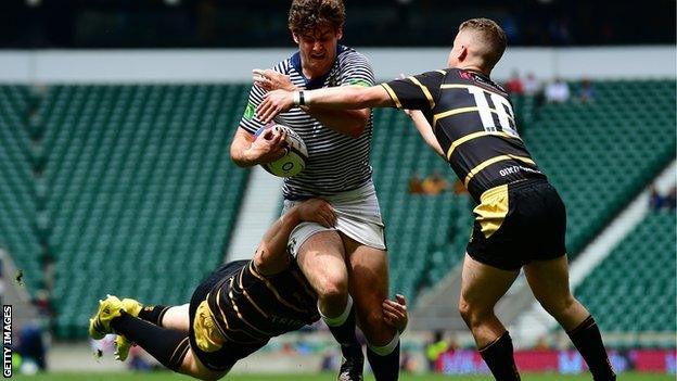 Billy Searle was at Twickenham to stop tries as well as score them, aided in halting Cheshire's Jack Lavin by Tom Cowan-Dickie