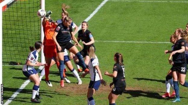 Chloe Kelly's left-wing corner went in off home keeper Becky Spencer for Man City's opener at The Hive