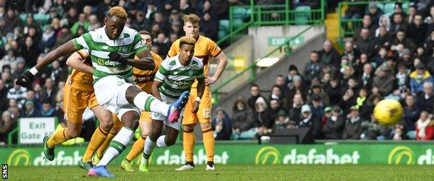 Moussa Dembele scores a penalty