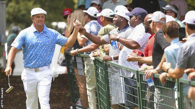 Bryson DeChambeau with fans at the Tour Championship in September 2021