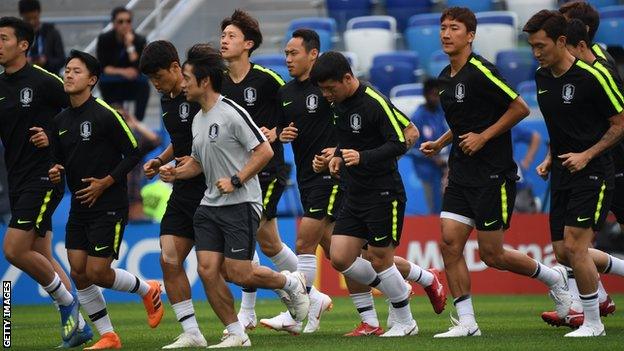 South Korea's players take part in a training session at Nizhny Novgorod Stadium on 17 June on the eve of their World Cup Group H match against Sweden