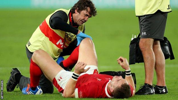 George North receives treatment