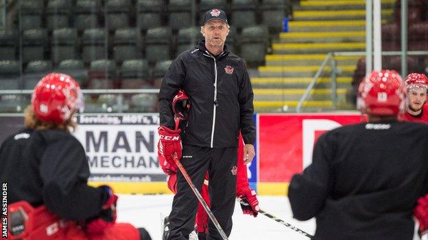 Cardiff Devils boss Jarrod Skalde with players