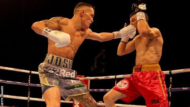 Josh Warrington hits Sofiane Takoucht with a left jab