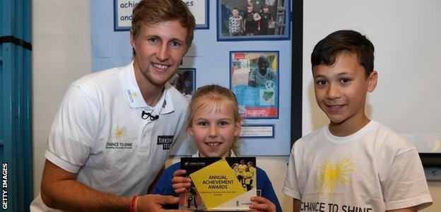 Joe Root meets pupils from his former school, Dore Primary School, in Sheffield