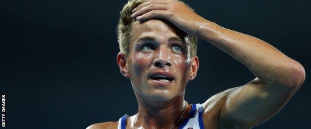 Andrew Butchart reacts after the Olympic 5,000m final