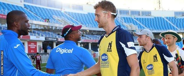 Bears fast bowler Oliver Hannon-Dalby leads the handshakes against their West Indies opponents