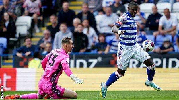 Lucas Joao rounds Stoke keeper Jack Bonham.