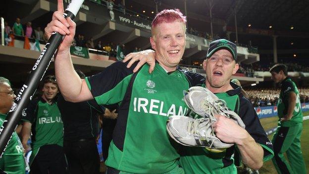 Ireland's Kevin O'Brien and Niall O'Brien celebrate after beating England at the 2011 cricket World Cup