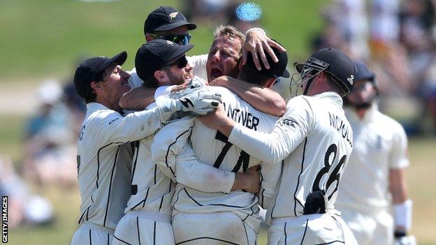 New Zealand players celebrate after securing first Test victory over England by an innings and 65 runs