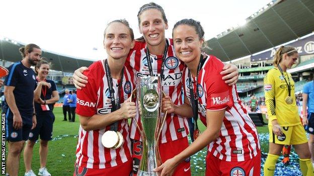 Jessica Fishlock, Rebekah Stott and Lauren Barnes of Melbourne City celebrate victory during the W-League Grand Final match between Sydney FC and Melbourne City FC at Allianz Stadium on February 18, 2018