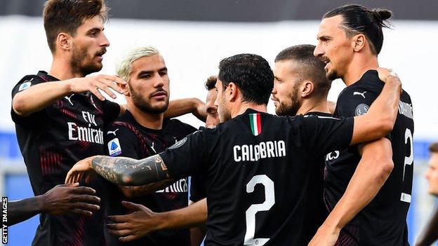 AC Milan players celebrating with Zlatan Ibrahimovic