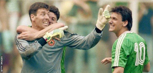 Bonner is mobbed by team-mates Andy Townsend and Tony Cascarino after his save