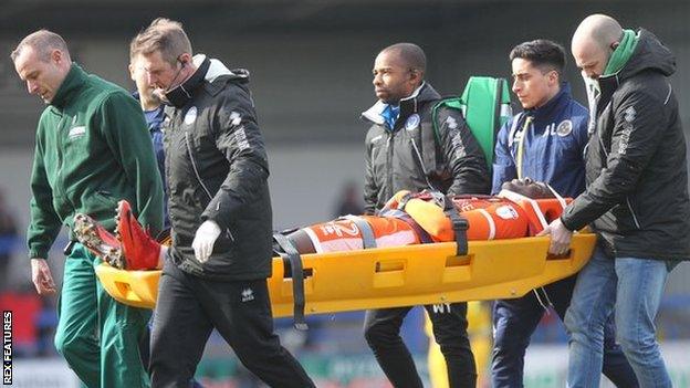 Toto Nsiala was stretchered off in the Good Friday defeat at Rochdale