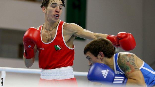 Conlan lands a punch during his semi-final victory