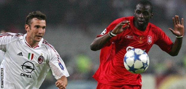 Andriy Shevchenko and Djimi Traore compete for the ball