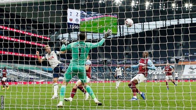 Harry Kane heads home Tottenham's third goal