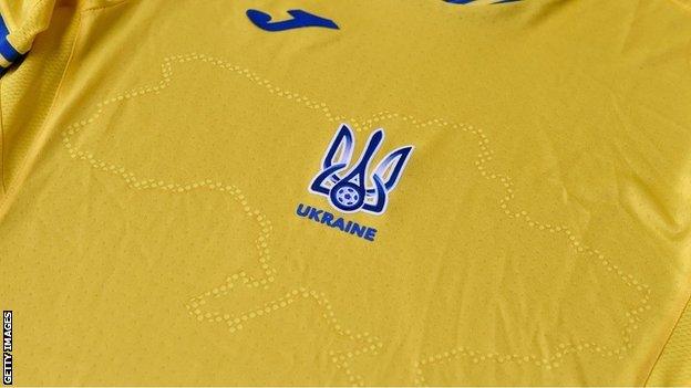 Ukraine's shirt, emblazoned with its borders including Russian-annexed Crimea